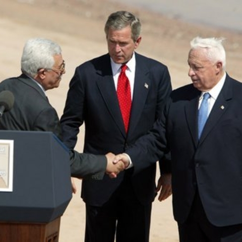 Palestinian Prime Minister Mahmoud Abbas, United States President George W. Bush, and Israeli Prime Minister Ariel Sharon after reading statement to the press during the closing moments of the Red Sea Summit in Aqaba, Jordan, June 4, 2003.