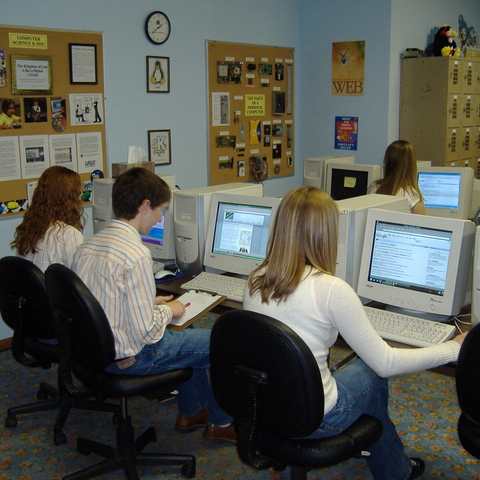 Schools often have dedicated computer labs which different classes share for studying and research.