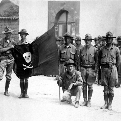 U.S. Marines holding Sandino's Flag - Nicaragua 1932.