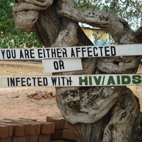 Sign that reads, "You are either affected or infected with HIV/AIDS."