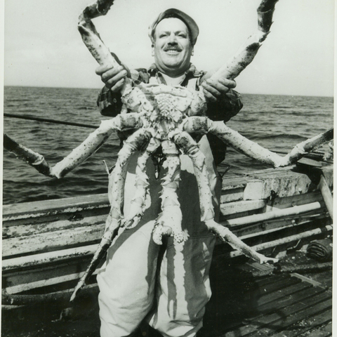 man with giant crab