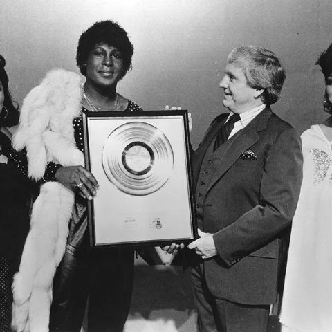 Sylvester receiving the RIAA Gold record for Step II, with Martha Wash and Izora Rhodes - Photo by Michael Ochs/Michael Ochs Archives/Getty Images