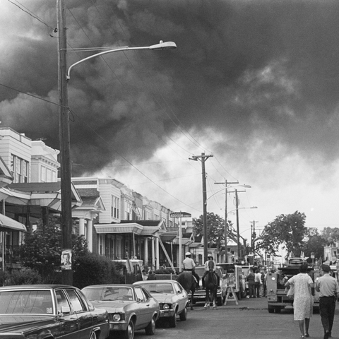 Smoke Billowing Over Neighborhood