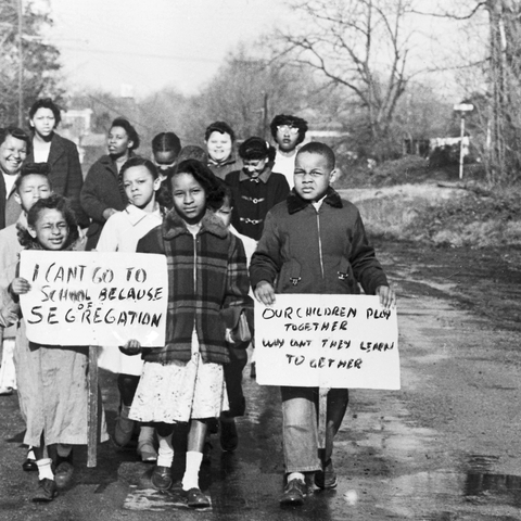 Mothers and children marching for school desegregation - Photo by Bettmann Collection/Getty Images