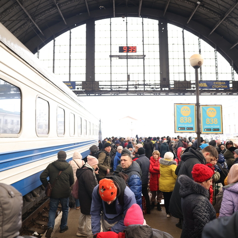 Ukrainian refugees board a train in Lviv, February 2022. 