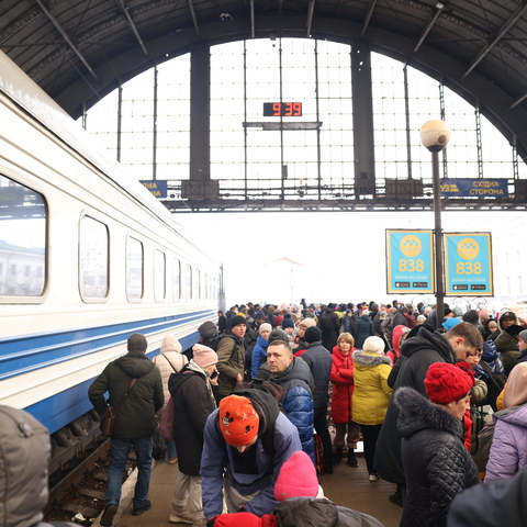 Ukrainian refugees board a train in Lviv, February 2022.