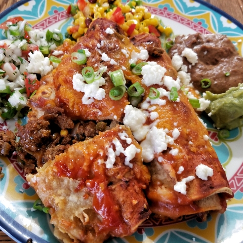 Plate of enchiladas at a Mexican restaurant. 