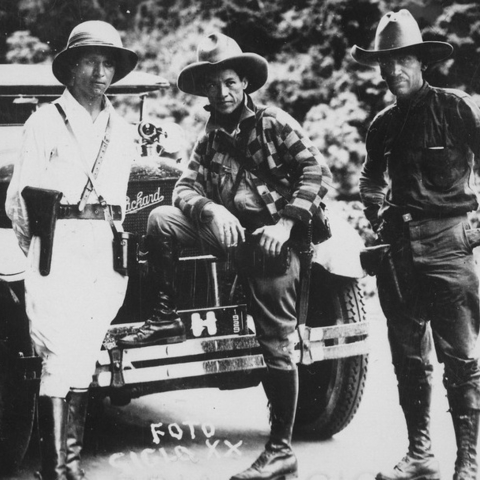 General Sandino and Staff standing near a car
