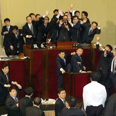 Korean politicians at a podium