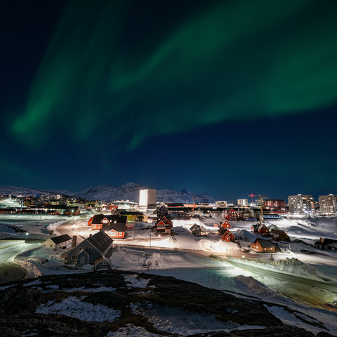 Nuuk, Greenland skyline with the aurora borealis.
