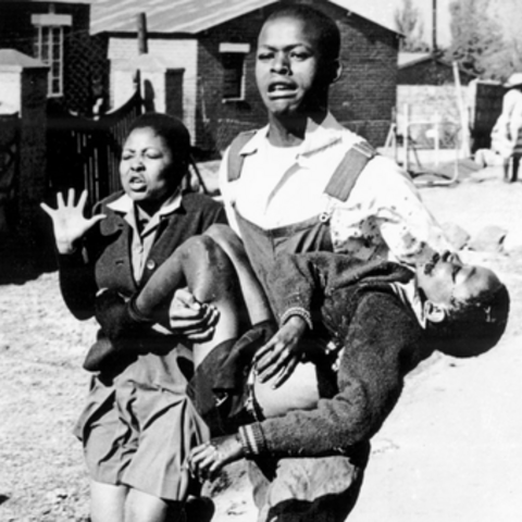 Mbuyisa Makhubu carries Hector Pieterson after Pieterson was shot and killed at the Soweto Uprising. Antoinette Sithol, Pieterson's sister, runs beside them.