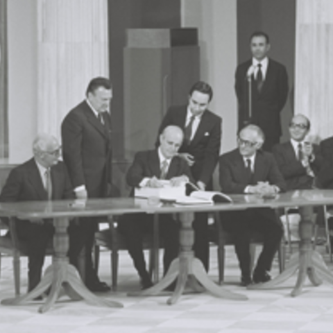 Officials signing the documents for the accession of Greece to the European Union.