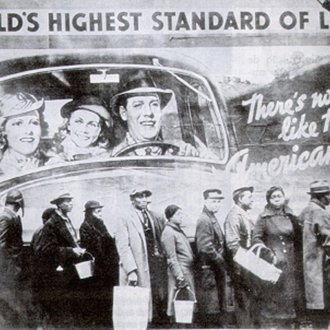 This is a 1937 photo of African Americans in a relief line in front of a billboard.