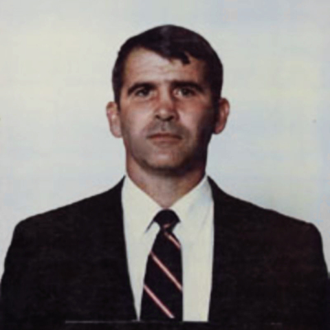 A mug shot of Oliver North after his 1987 arrest.