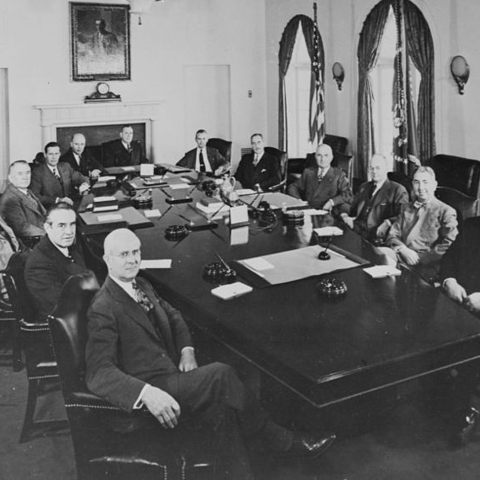 President Harry S. Truman meeting with his cabinet.