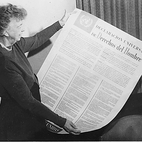 Former First Lady Eleanor Roosevelt holding a Spanish version of the UN Universal Declaration of Human Rights.