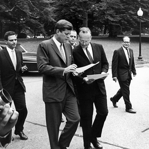 President John F. Kennedy conferring with McGeorge Bundy.