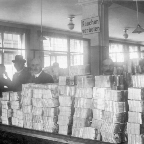 German paper currency had become so devalued that large stacks were required even for small purchases.