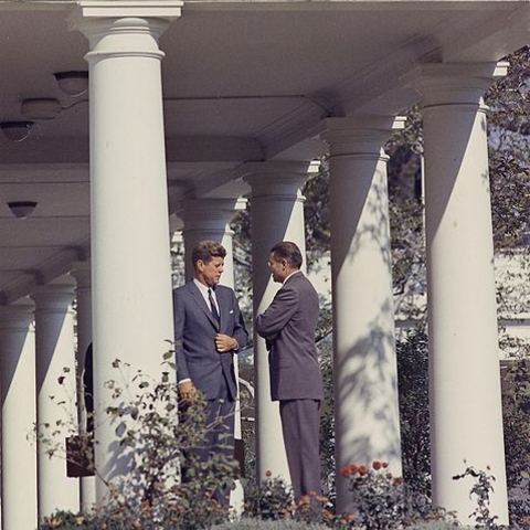 President John F. Kennedy and Secretary of Defense Robert S. McNamara meeting outside the Oval Office.