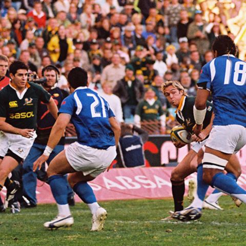Springbok Rugby player Percy Montgomery moves against the Samoan National team in 2007