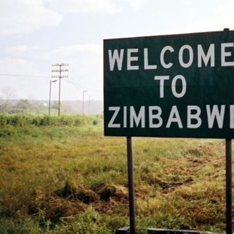A roadsign welcoming travelers to Zimbabwe