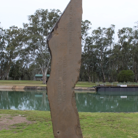Flood marker on the River Murray, with the peak marking the high point of the 1956 flood