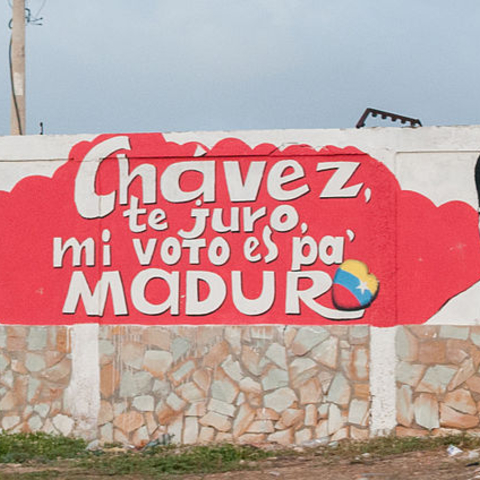The sign reads: 'Chávez, I swear, my vote is for Maduro.'