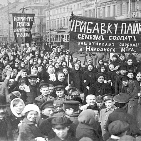 The banners read: 'Feed the children of the defenders of the motherland” and “Increase payments to the soldiers’ families—defenders of freedom and world peace.'