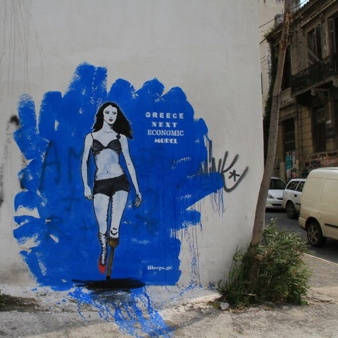 2011 street art in Athens, Greece depicting the country’s financial woes.
