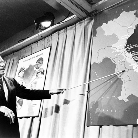 Secretary of Defense Robert McNamara lecturing on Vietnam.