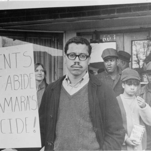 Opponents of the Vietnam War demonstrating against Robert McNamara.