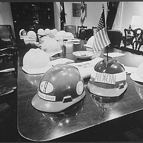 Hard hats left on a White House table.