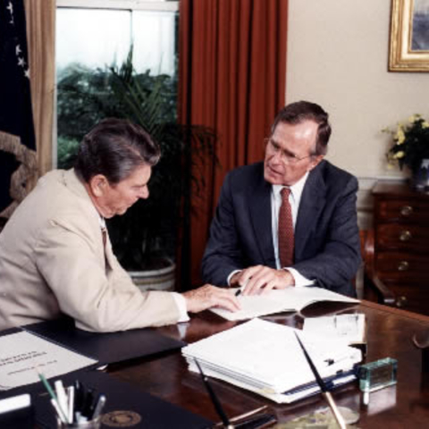 President Ronald Reagan meeting with Vice President George H.W. Bush.