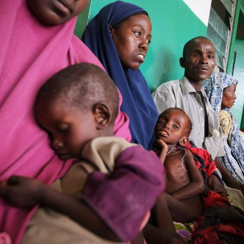 Drought and famine have compounded violence in Somalia and devastated the population. Parents wait with their malnourished and dehydrated children in a corridor at a hospital in Mogadishu in August 2011.