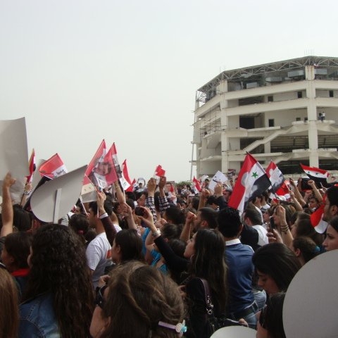 A pro-Asad student rally at Tishreen University in Latakia