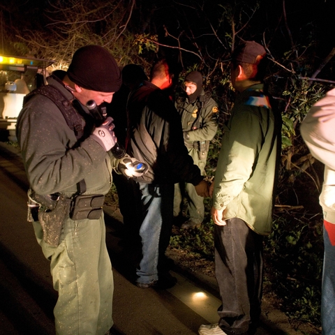 U.S. Border Patrol guards intercepting illegal immigrants from Mexico in Southern California