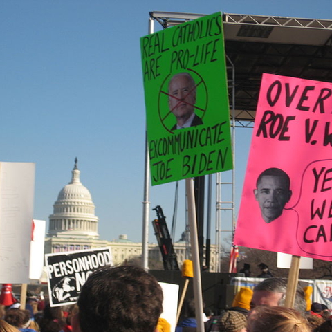 Demonstrators hold signs at the 2009 March for Life in Washington, D.C.