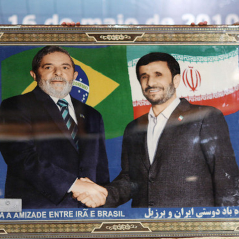 Brazilian President Luiz Inácio Lula da Silva and Iranian President Mahmoud Ahmadinejad hold a picture of themselves that reads “Long live the friendship between Iran and Brazil”
