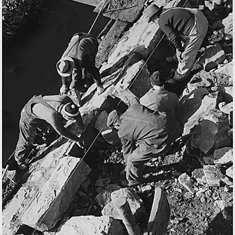 Workers on a Works Progress Administration road-building project.