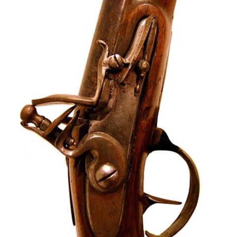 Detail of the flintlock of an 18th-century hunting rifle