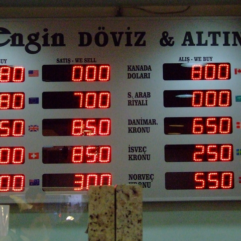A sign shows currency exchange rates at an office in Turkey