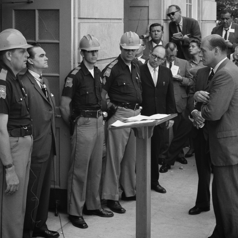 Governor George Wallace blocks U.S. Deputy Attorney General Nicholas Katzenbach from the door at the University of Alabama in an effort to stop desegregation