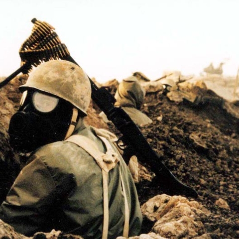 An Iranian soldier wearing a gas mask during the Iran-Iraq War.