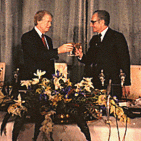 President Jimmy Carter offers a toast to Mohammed Reza Shah Pahlavi, calling Iran 'an island of stability in one of the more troubled areas of the world.'