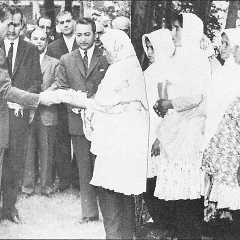 Shah Mohammed Reza Pahlavi distributes land ownership documents to women during his "White Revolution,"1963
