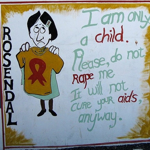 Street art in South Africa from 2008 appealing for men to not rape children.