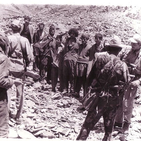 Soviet soldiers after capturing Mujahideen fighters in Afghanistan.