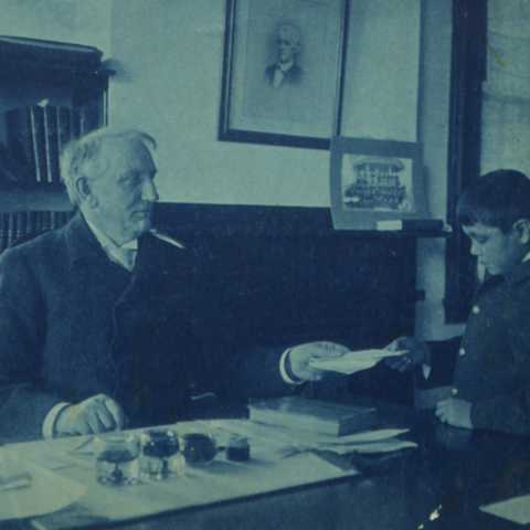 Richard Henry Pratt with a student.
