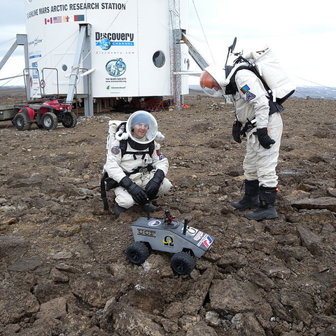 The Flashline Mars Arctic Research Station with two crew members.