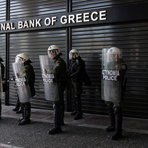 Thousands of Greeks went on strike and threw stones at the police.